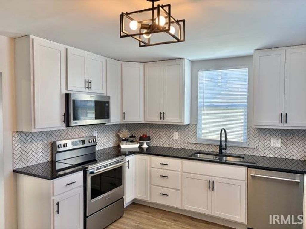 Photo of 522 E Main Street, Peru, IN 46970 (MLS # 202548395)