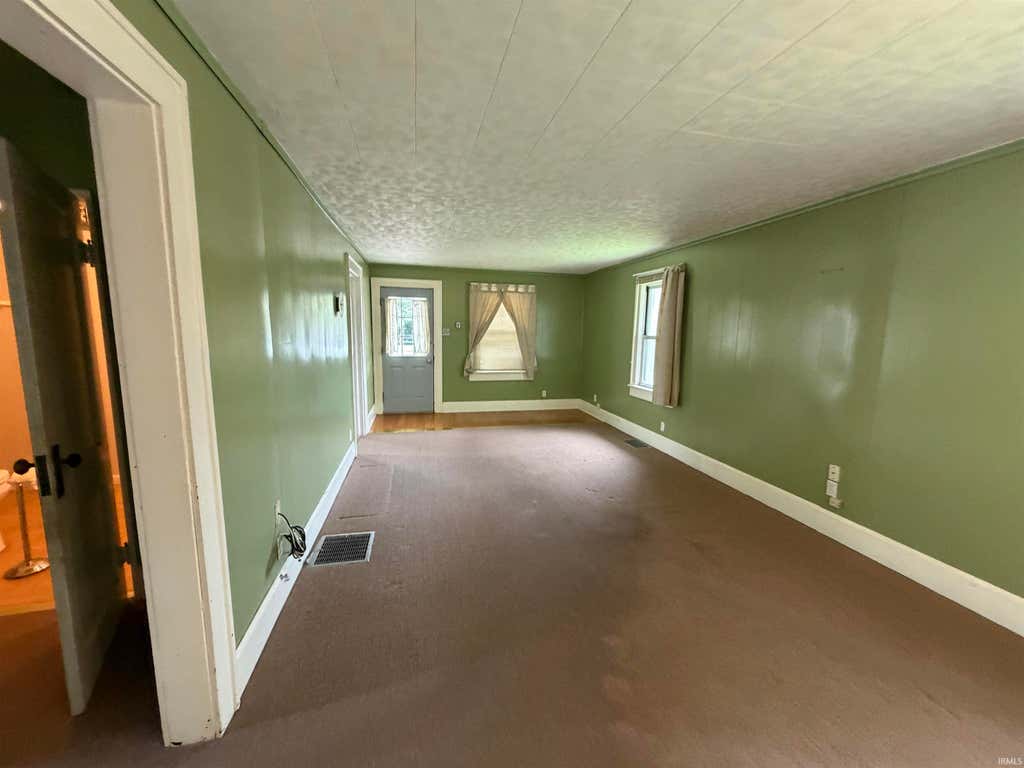 Photo of 1917 7Th Street, Bedford, IN 47421 (MLS # 202625668)