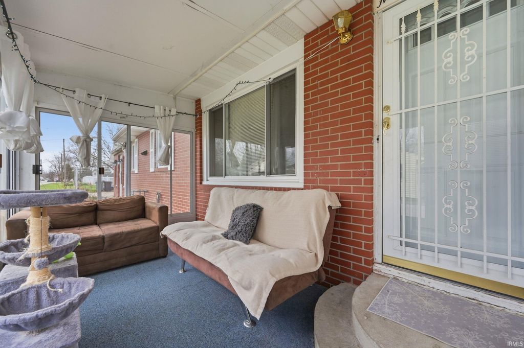 Photo of 901 W Elm Street, Hartford City, IN 47348 (MLS # 202613670)
