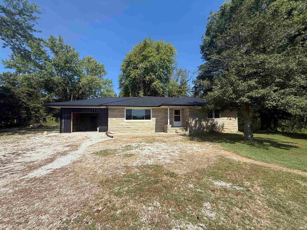 Photo of 9462 E State Road 70 Highway, Evanston, IN 47531 (MLS # 202637998)
