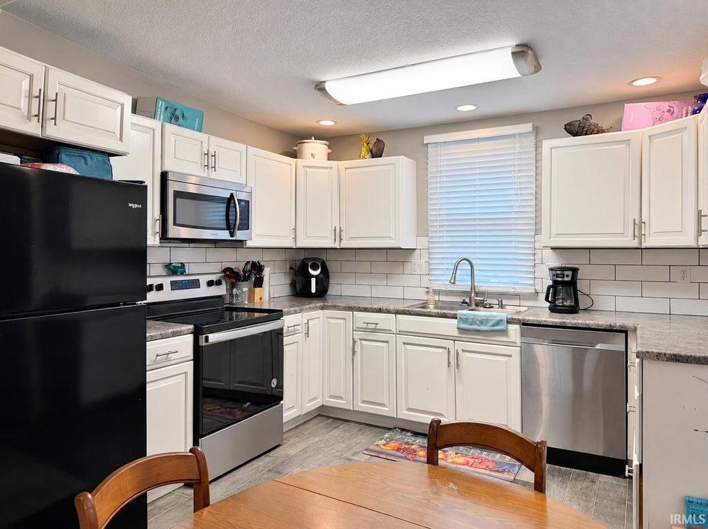 Photo of 119 E Highland Avenue, Marion, IN 46952 (MLS # 202639691)