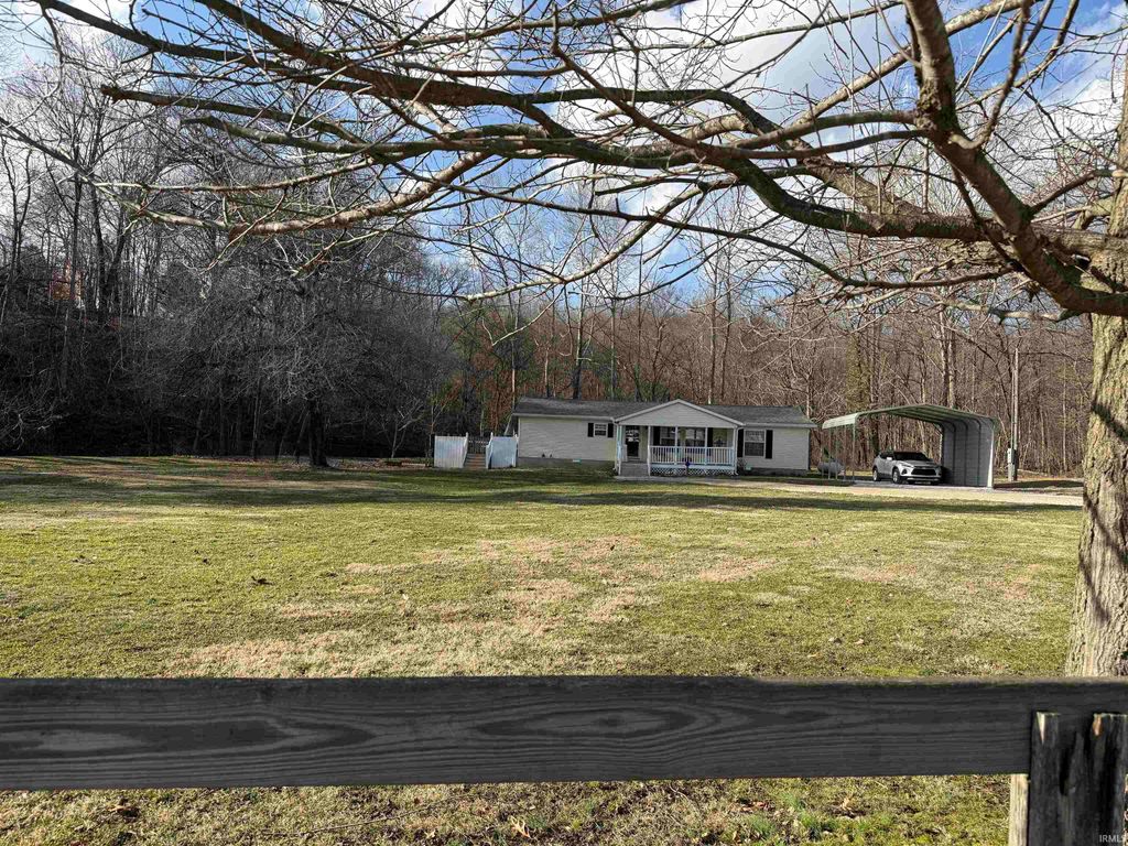 Photo of 115 Elm Street St, Heltonville, IN 47436 (MLS # 202605433)