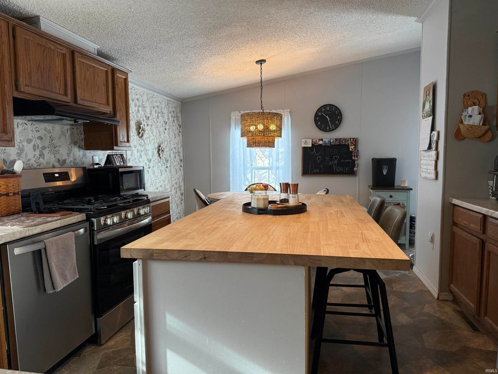 Photo of 115 Elm Street St, Heltonville, IN 47436 (MLS # 202605433)