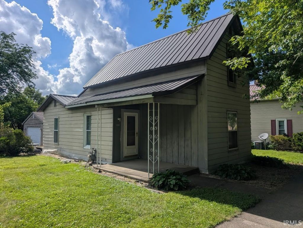 Photo of 111 S Spring Street, Wakarusa, IN 46573 (MLS # 202624599)