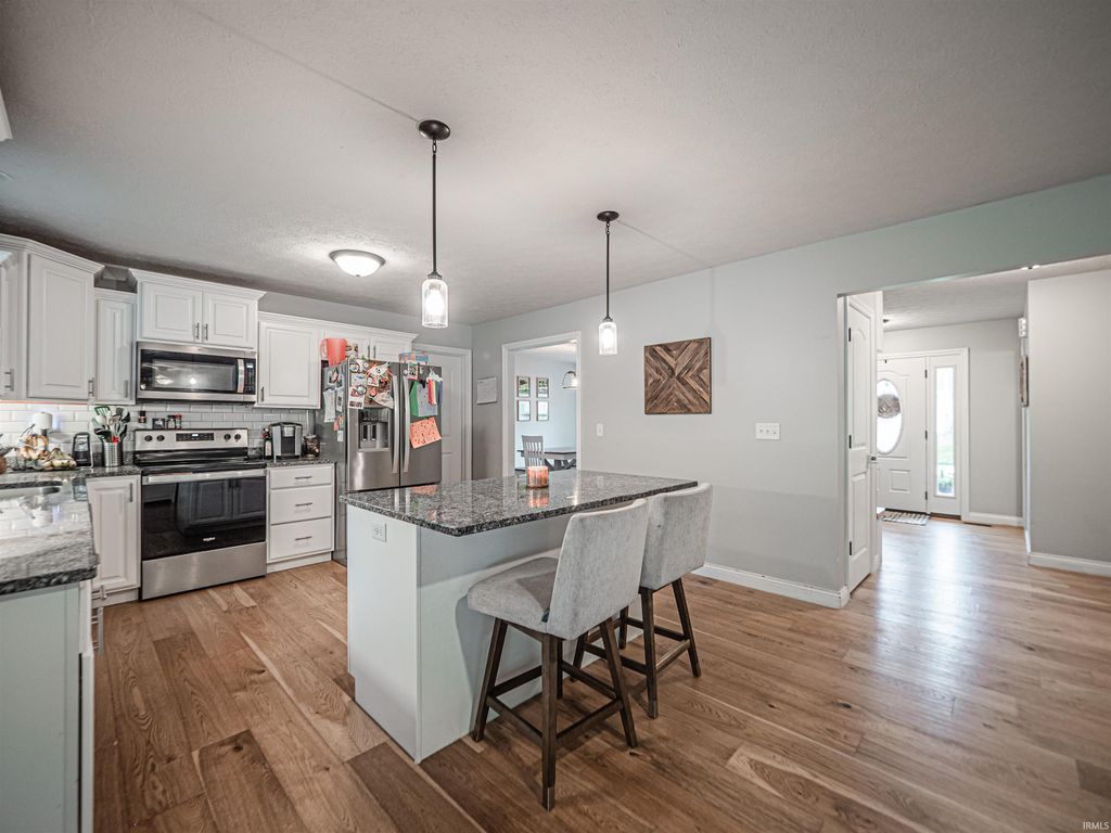 Photo of 1635 Hills Drive, Evansville, IN 47720 (MLS # 202616782)