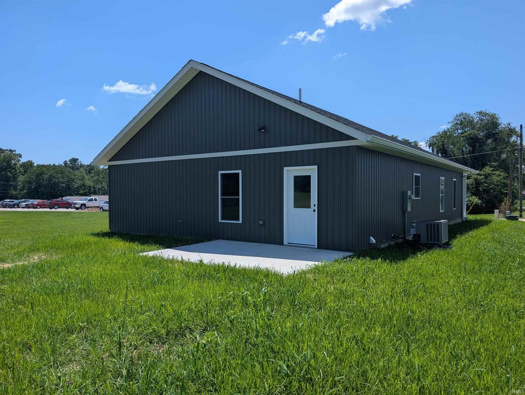 Photo of 219 Poplar Street, Loogootee, IN 47553 (MLS # 202628372)