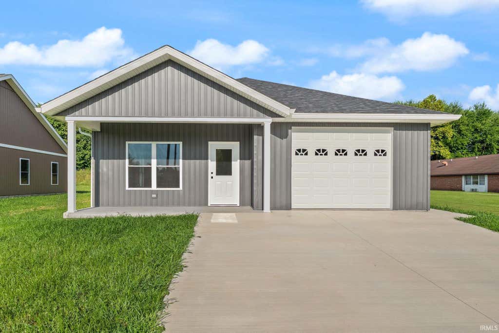 Photo of 219 Poplar Street, Loogootee, IN 47553 (MLS # 202628372)