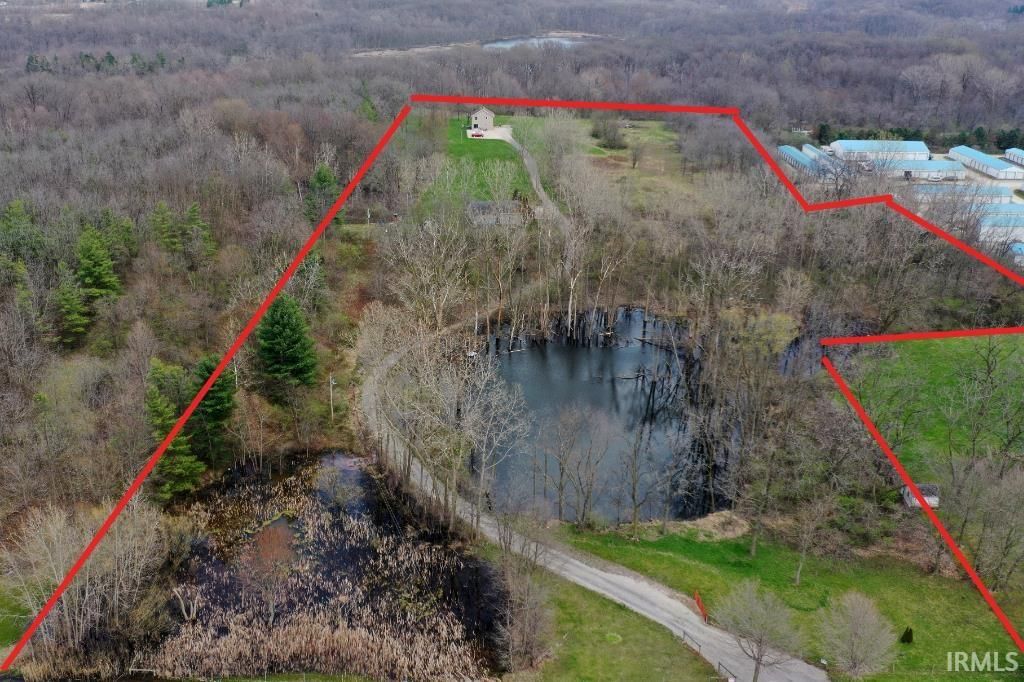 Photo of 8230 N State Road 13, Syracuse, IN 46567 (MLS # 202539941)