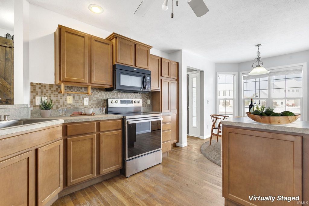 Photo of 3127 Brunswick Square Drive, Mishawaka, IN 46544 (MLS # 202547950)