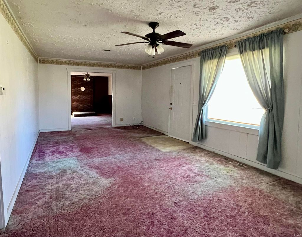 Photo of 324 W GRISSOM Avenue, Mitchell, IN 47446 (MLS # 202610393)