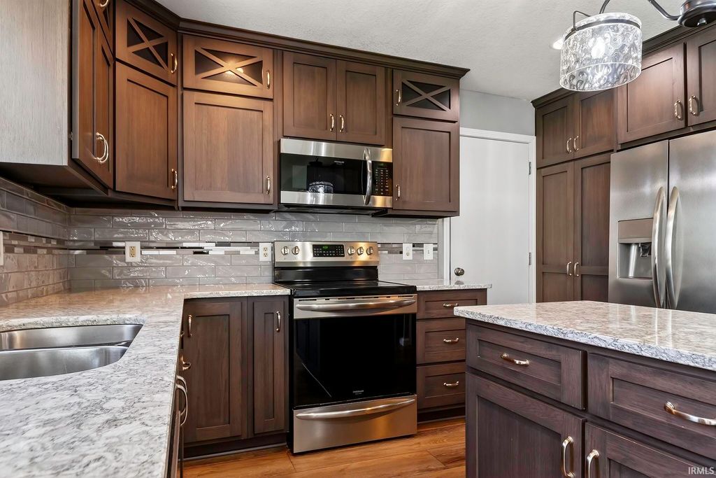 Photo of 1003 Woodcreek Drive, Ossian, IN 46777 (MLS # 202617543)