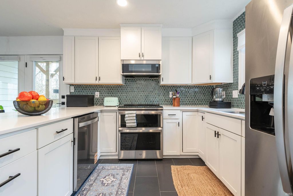 Photo of 9401 S Pointe Retreat Drive, Bloomington, IN 47401 (MLS # 202607789)