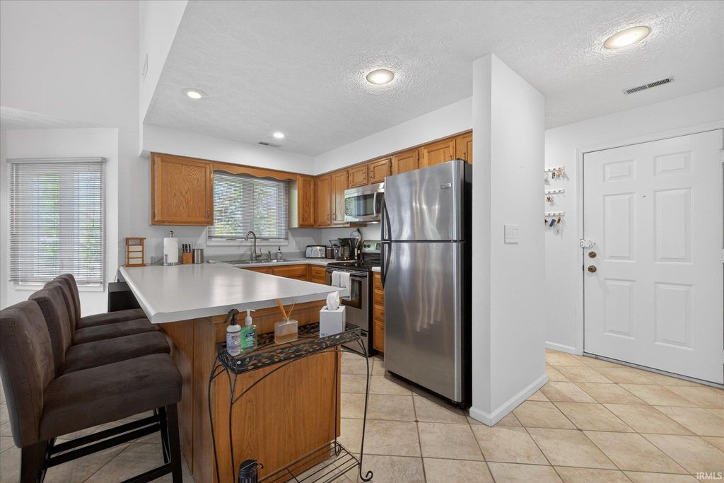 Photo of 9708 S Harbour Pointe Drive, Bloomington, IN 47401 (MLS # 202611162)