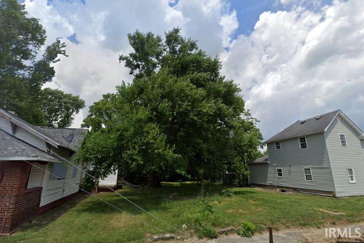 Photo of 1420 E WILLARD Street, Muncie, IN 47302 (MLS # 202638135)