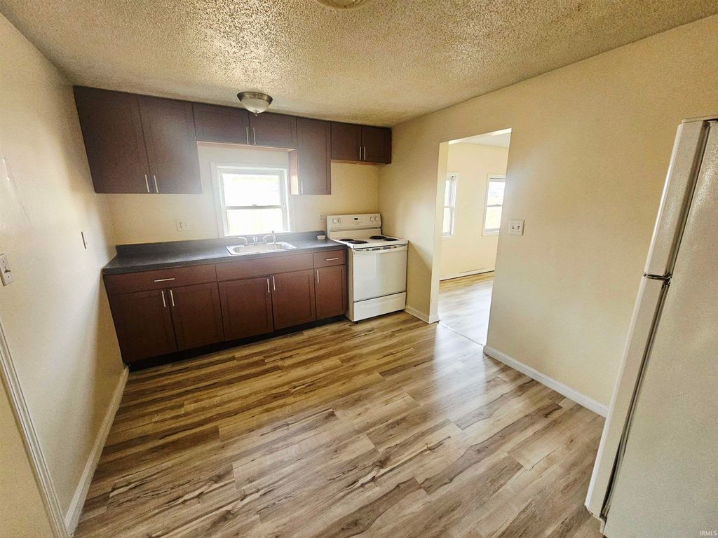 Photo of 3312 E 16th Street, Muncie, IN 47302 (MLS # 202547183)