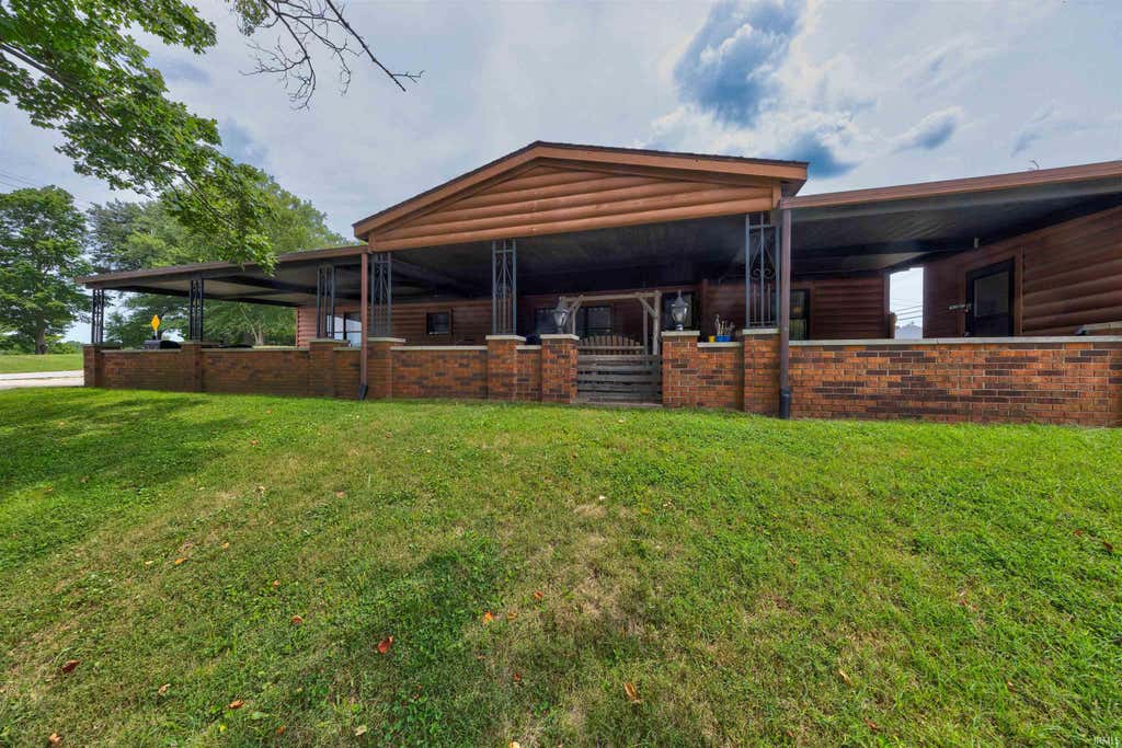 Photo of 110 W Fletchall Street, Poseyville, IN 47633 (MLS # 202633336)