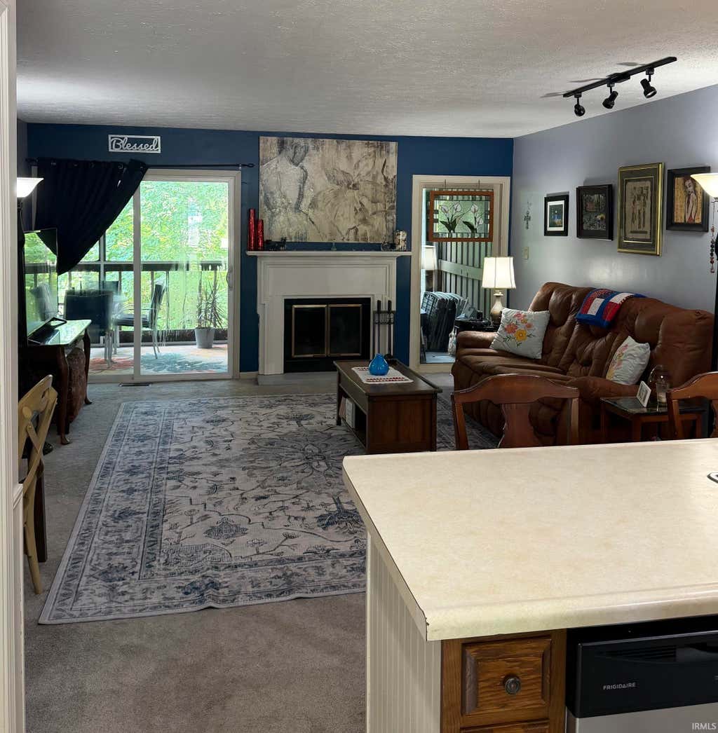 Photo of 1941 E WATER EDGE Drive #6, Bloomington, IN 47401 (MLS # 202626731)
