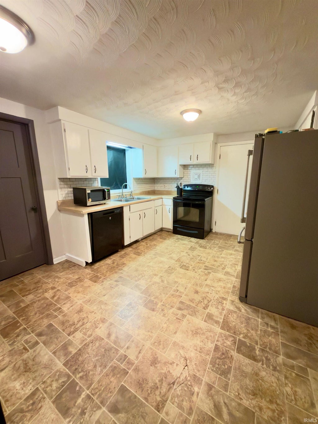 Photo of 405 N Hill Street, Fairmount, IN 46928 (MLS # 202643039)