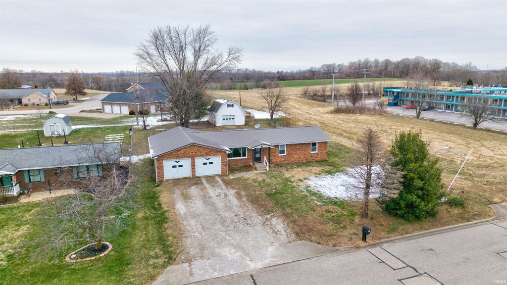 Photo of 310 E 22nd Street, Huntingburg, IN 47542 (MLS # 202549096)