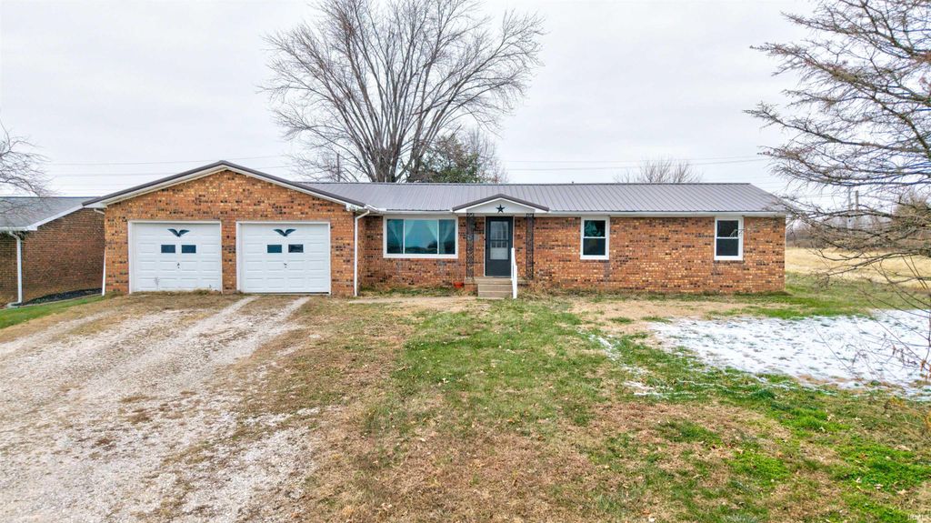Photo of 310 E 22nd Street, Huntingburg, IN 47542 (MLS # 202549096)