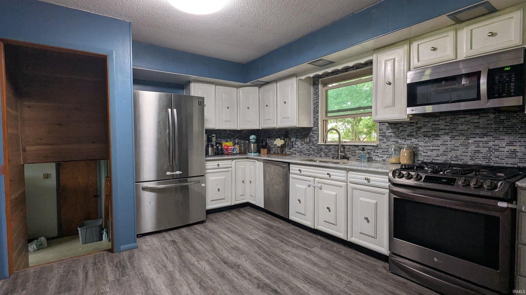 Photo of 8141 Wheeling Pike, Jonesboro, IN 46938 (MLS # 202637143)