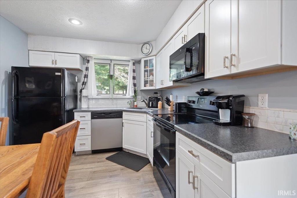 Photo of 9393 S Pointe Retreat Drive, Bloomington, IN 47401 (MLS # 202613028)