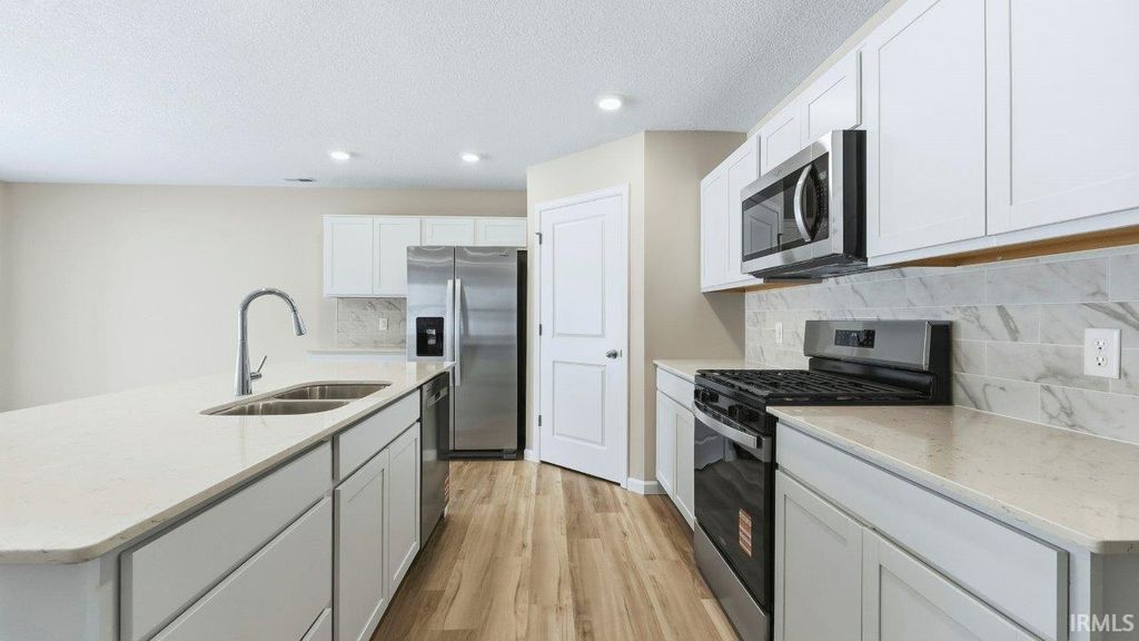 Photo of 12780 Watts Drive, Fort Wayne, IN 46818 (MLS # 202546347)