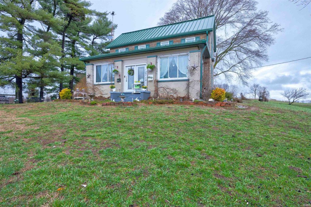 Photo of 8229 S 950 W, Owensville, IN 47665 (MLS # 202607304)