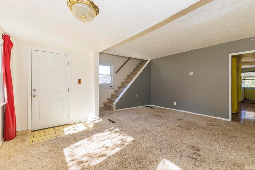 Photo of 418 E Streeter Avenue, Muncie, IN 47303 (MLS # 202643328)