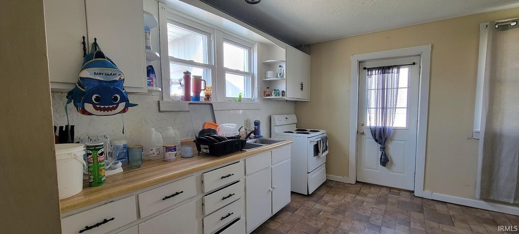 Photo of 106 SW 2Nd Street, Loogootee, IN 47553 (MLS # 202610281)