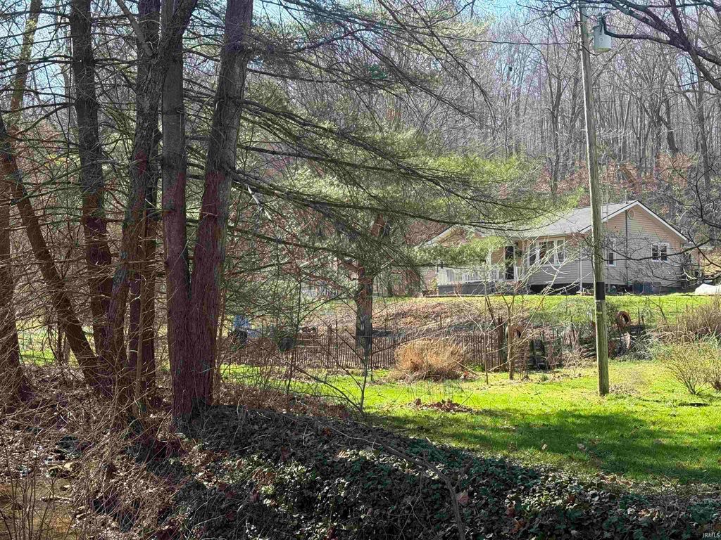 Photo of 10559 Boyd Hollow Road, Shoals, IN 47581 (MLS # 202608960)