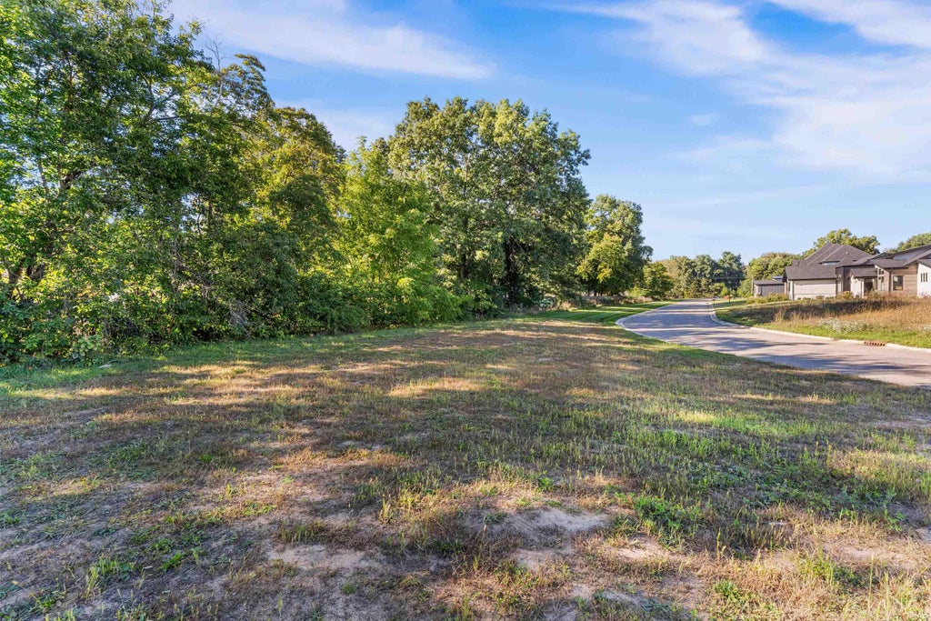 Photo of 11560 Greyson Alan Drive #8, Granger, IN 46530 (MLS # 202641539)