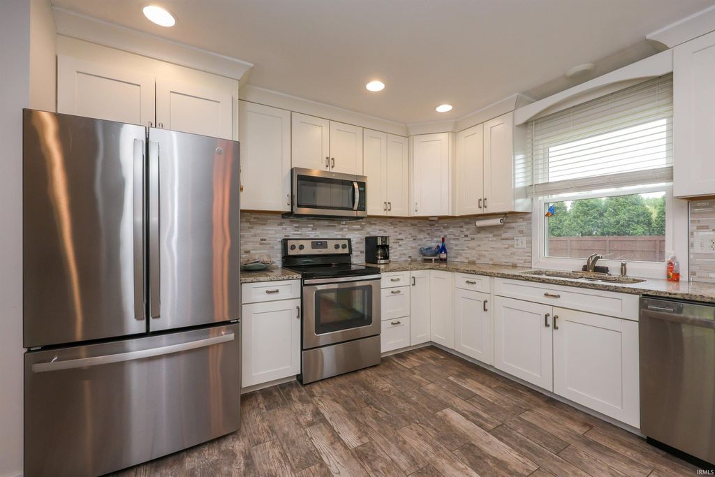 Photo of 1205 Ludwig Park Drive, Fort Wayne, IN 46825 (MLS # 202615763)