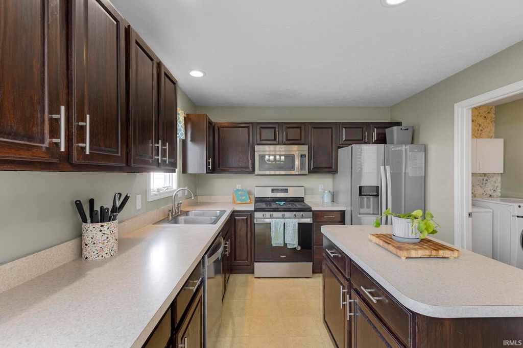 Photo of 1913 Miniature Rose Lane, Mishawaka, IN 46544 (MLS # 202610338)