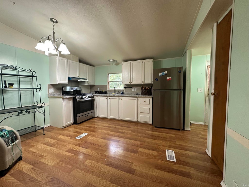 Photo of 1319 W Gourley Pike, Bloomington, IN 47404 (MLS # 202637403)