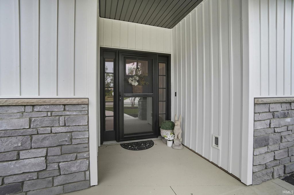 Photo of 1094 Midnight Chase Grove, Fort Wayne, IN 46845 (MLS # 202537730)