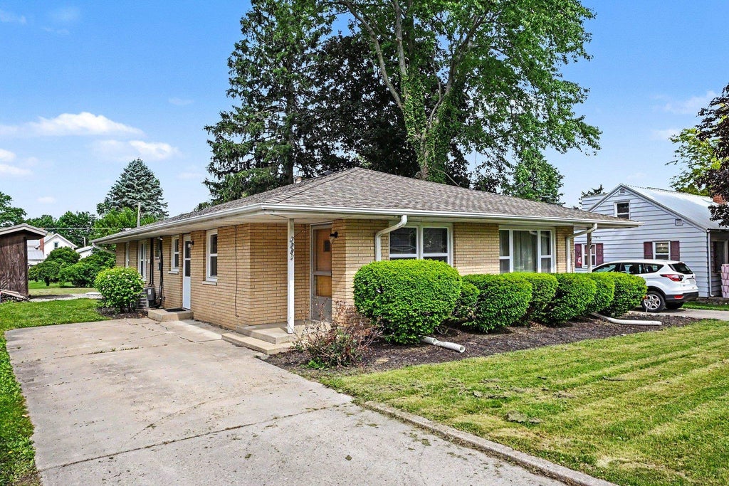 Photo of 319 S Park Street, Wakarusa, IN 46573 (MLS # 202620295)