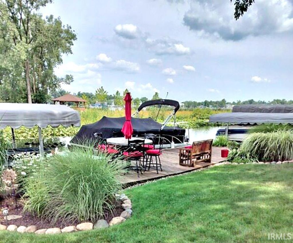 Photo of 5916 E George Street, Syracuse, IN 46567 (MLS # 202548494)