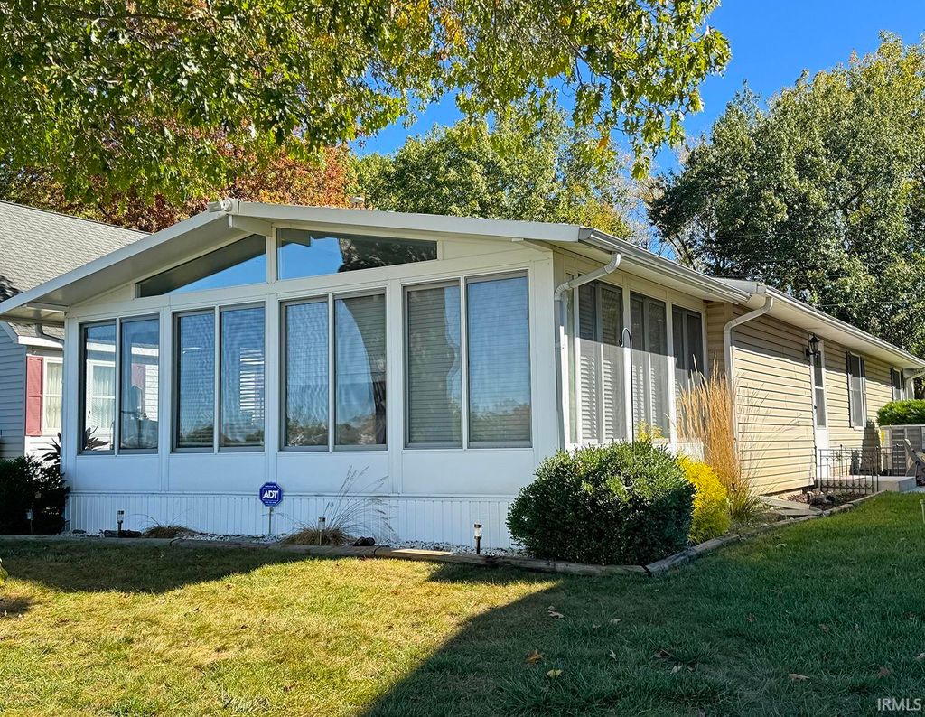 Photo of 5916 E George Street, Syracuse, IN 46567 (MLS # 202548494)