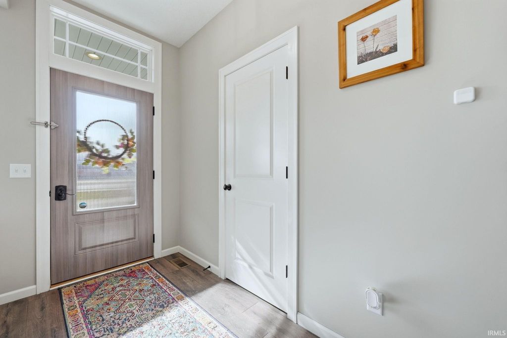 Photo of 9628 Bluffs Corner, Fort Wayne, IN 46825 (MLS # 202606743)