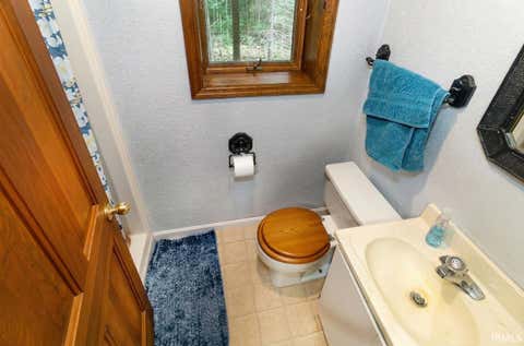 Tiny photo for 966 IN 66 Highway, New Harmony, IN 47631 (MLS # 202622428)