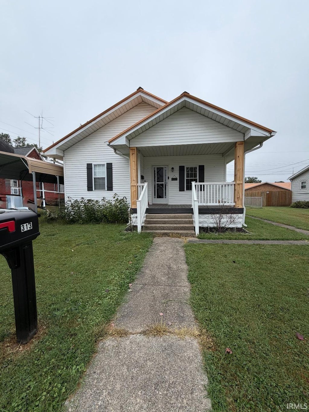 Photo of 313 S Park Avenue, Jasonville, IN 47438 (MLS # 202639102)