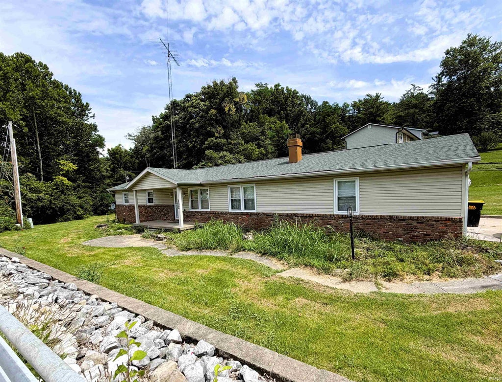 Photo of 302 W Main Street, Ellettsville, IN 47429 (MLS # 202627133)