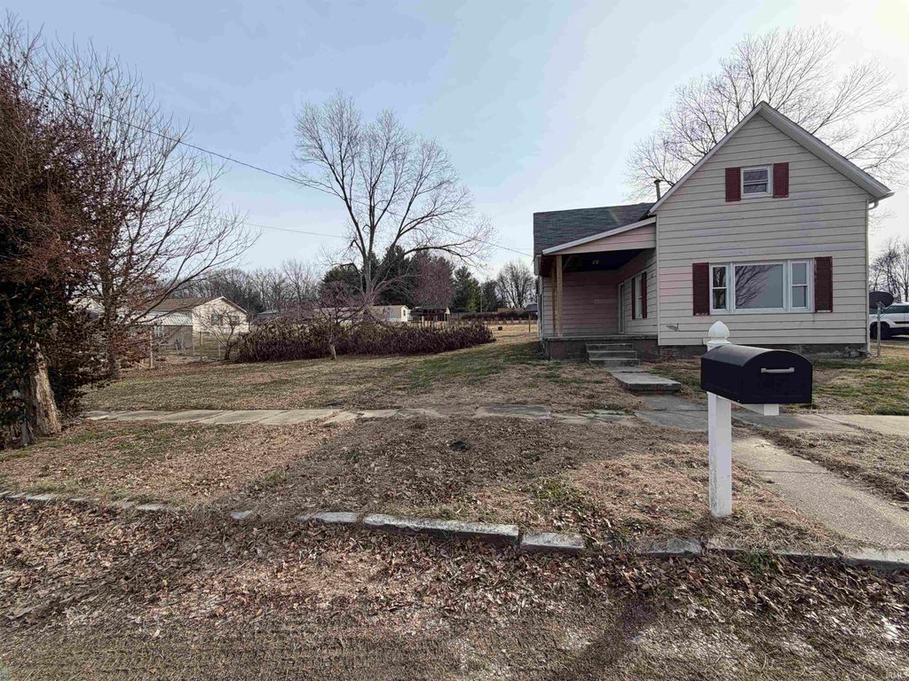 Photo of 617 S Main Street, Owensville, IN 47665 (MLS # 202605827)