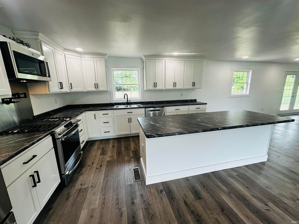 Photo of 1723 W St Rd 645 Highway, Loogootee, IN 47553 (MLS # 202615898)