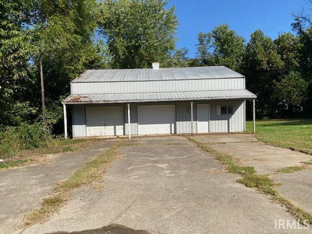 Photo of 1408 E Main Street, Petersburg, IN 47567 (MLS # 202541756)