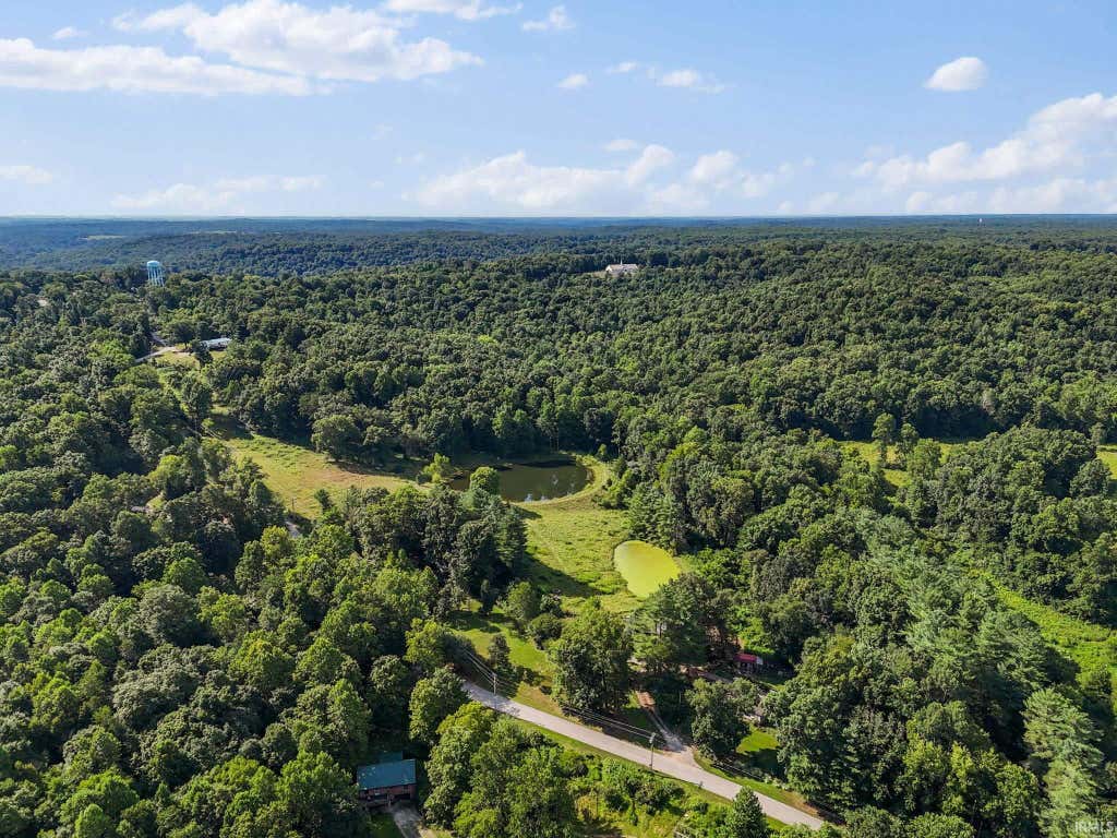 Photo of 10424 E Mineral Koleen Road, Owensburg, IN 47453 (MLS # 202634465)