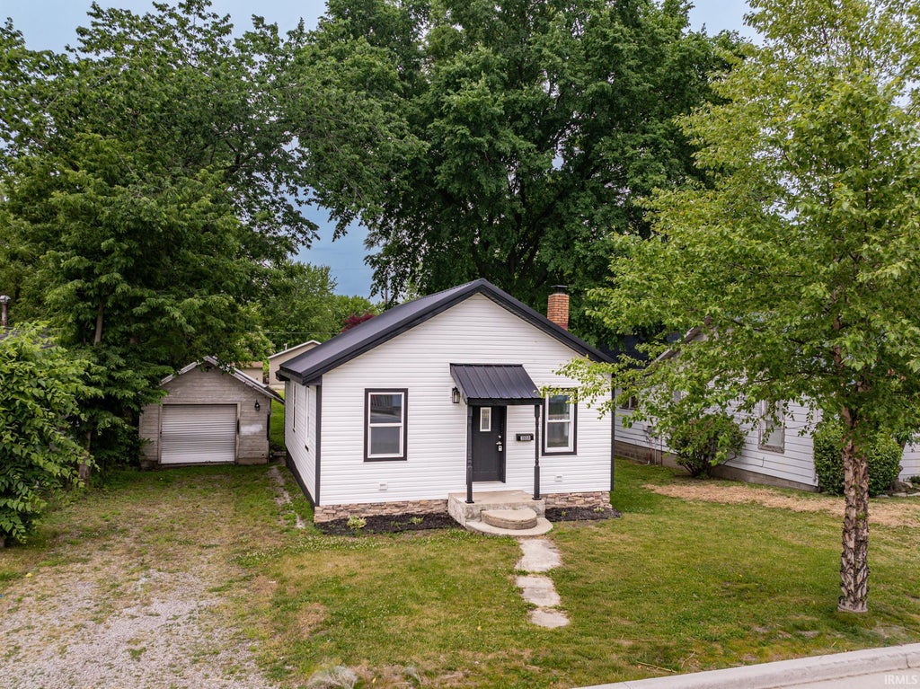 Photo of 308 W Boston Street, Syracuse, IN 46567 (MLS # 202622463)