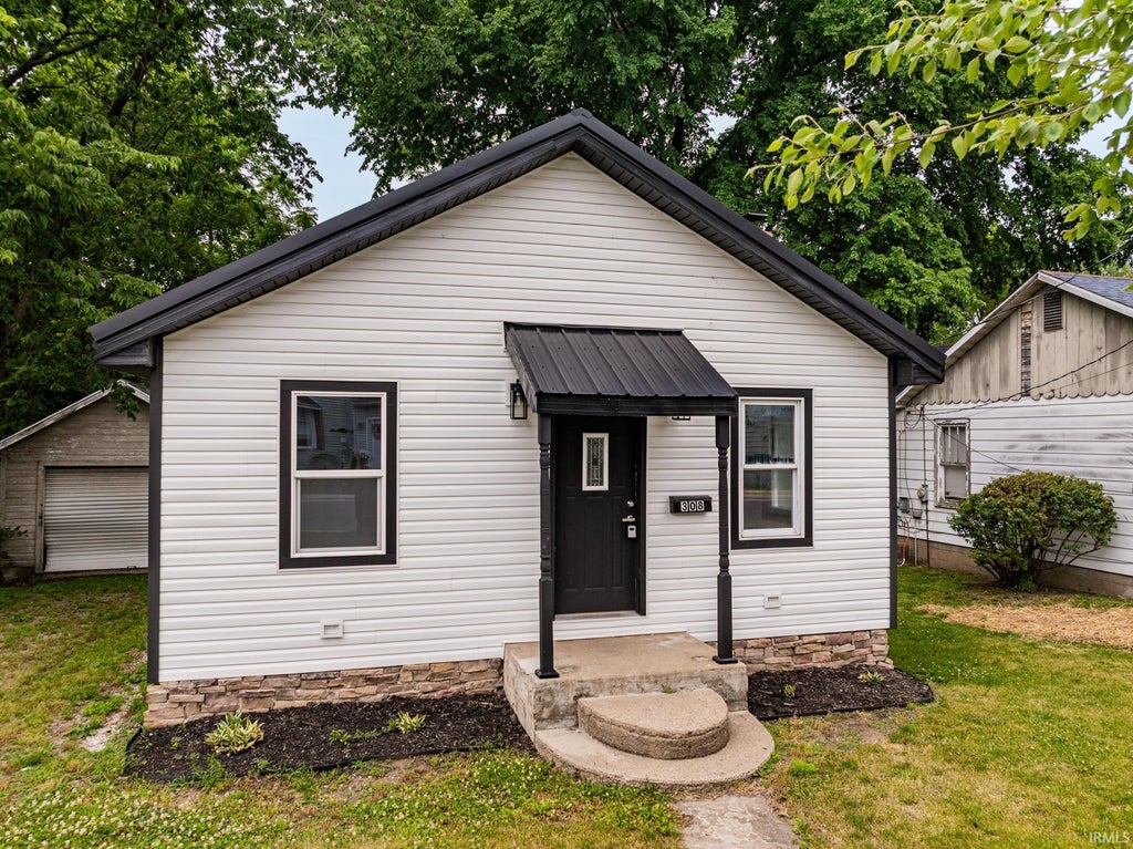 Photo of 308 W Boston Street, Syracuse, IN 46567 (MLS # 202622463)