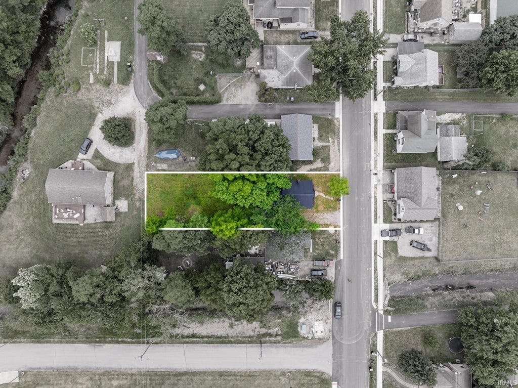 Photo of 308 W Boston Street, Syracuse, IN 46567 (MLS # 202622463)